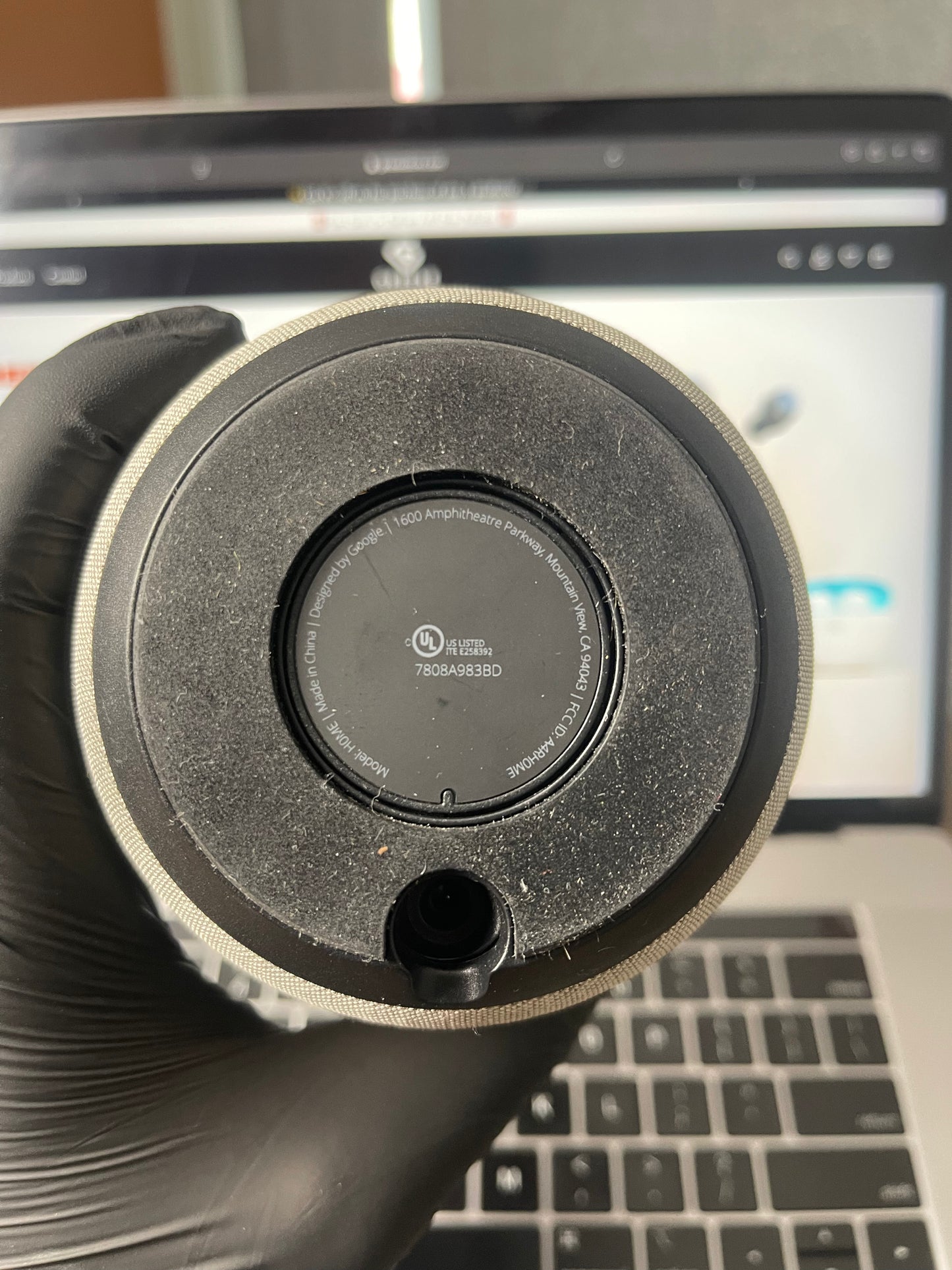 Google Home device promotional torn with original power adopter
