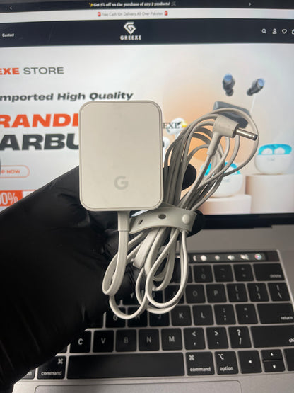Google Home device promotional torn with original power adopter